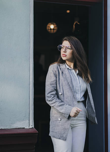 istock charming brunette girl in jacket 1300342811
