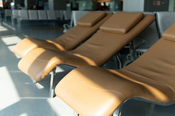 istock Comfortable deck chairs of airport waiting area 1300344891