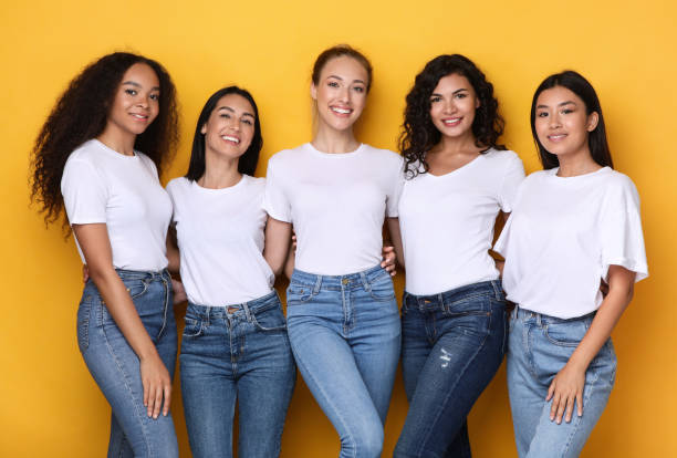 istock Group Of Five Diverse Models Ladies Posing On Yellow Background 1300347018