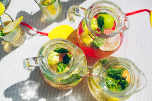 istock decanters with lemonade apple lemon mint leaves 1300349170