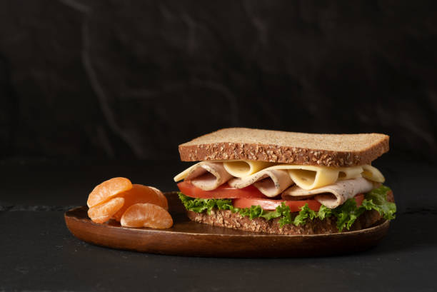Healthy sandwich on black background