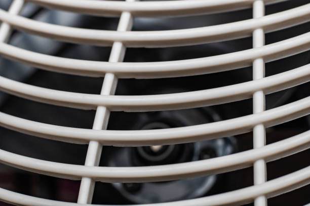 istock White plastic grill on the fan close up 1300350258