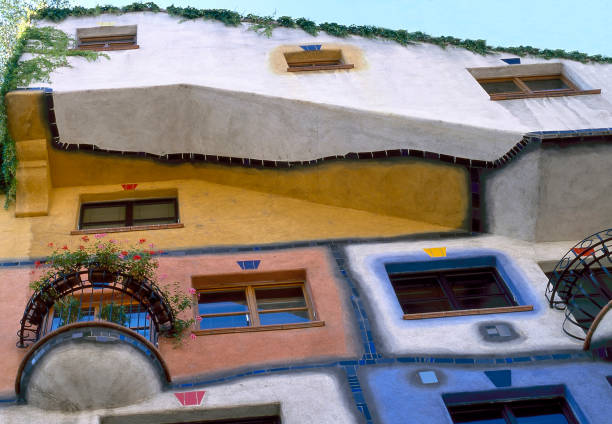 Hundertwasser House in Vienna VIENNA, AUSTRIA - MAY 14,2014: Hundertwasser Haus .Designed by Austrian artist and architect Friedensreich Hundertwasser with the architect Josef Cravinho hundertwasser house stock pictures, royalty-free photos & images