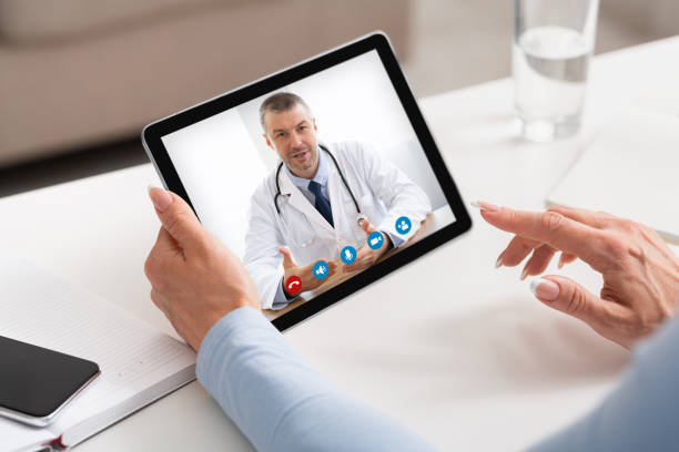 istock Video Call With Doctor. Unrecognizable Female Having Web Cinference With Therapist 1300351460