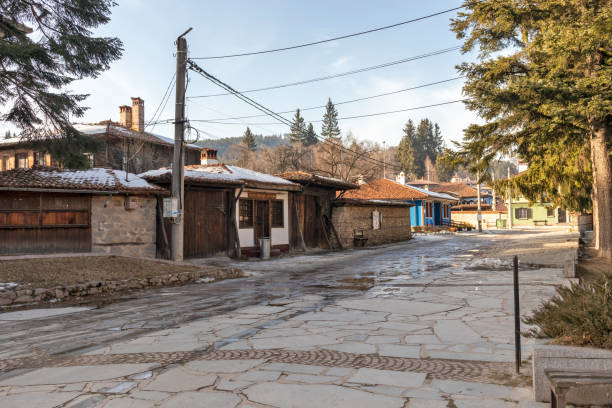 Street and old houses in historical town of Koprivshtitsa, Bulgaria Koprivshtitsa, Bulgaria - January 25, 2020: Typical Street and old houses in historical town of Koprivshtitsa, Sofia Region, Bulgaria bulgarian culture bulgaria bridge river stock pictures, royalty-free photos & images