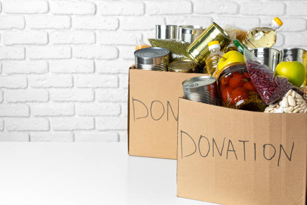 istock Donation box with various food. Pandemic support. 1300364096