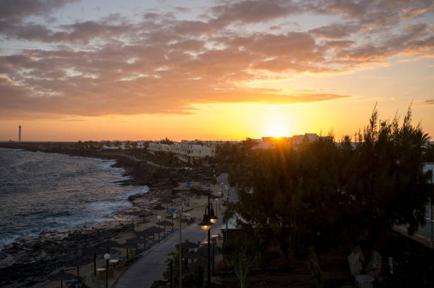 istock Seaside village in Lanzarote at sunset 1300366546