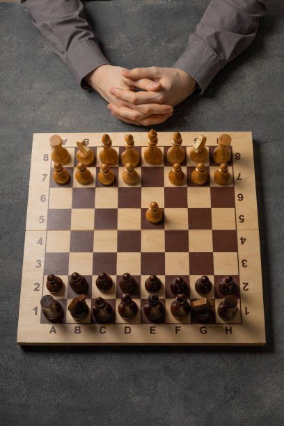 istock The first pawn move in a chess game 1300366588