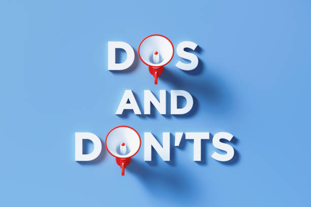 istock Dos and Don'ts Written By Red Megaphone on Blue Background 1300368316