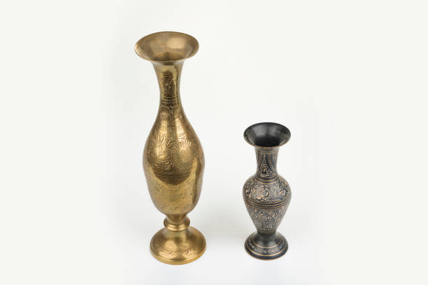 istock Gold metal carving vase on a white 1300369742