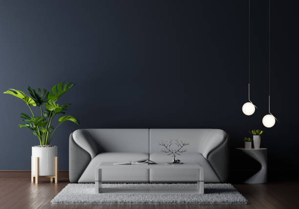 istock Sofa in dark living room wiht free space for mockup,3D rendering 1300371780