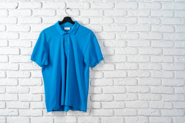 istock Blue cotton polo t-shirt texture close up 1300374709