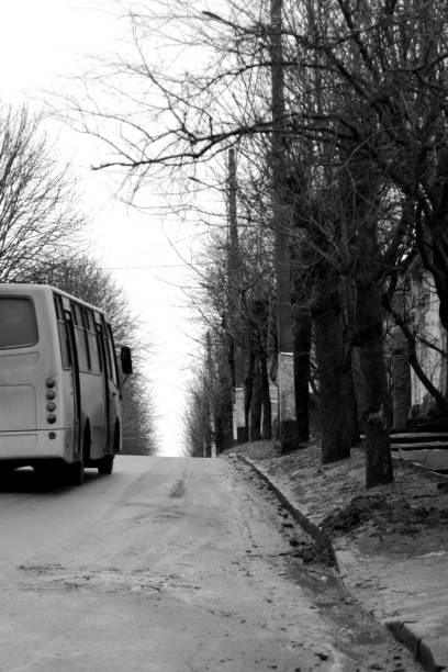 istock bus going uphill on street in town 1300377098