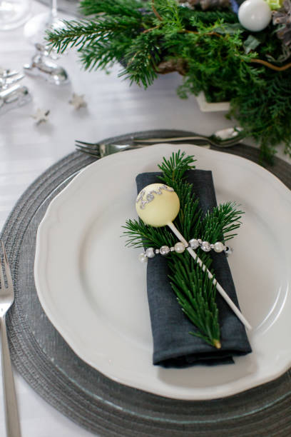 Stylish table decoration in gray with cake pop