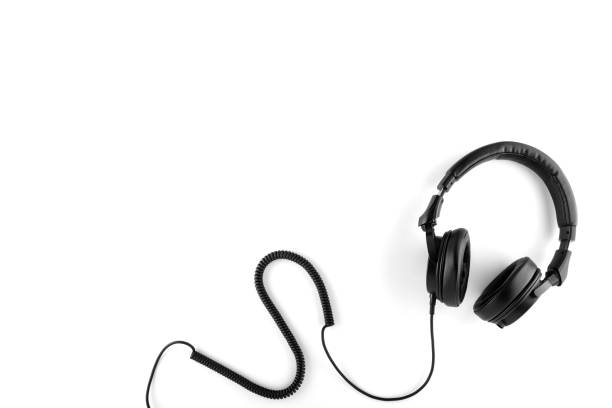istock Black headphones with a wire on a white background. 1300379721