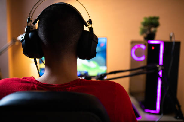 istock A young gamer playing an online multiplayer game at his home 1300381106