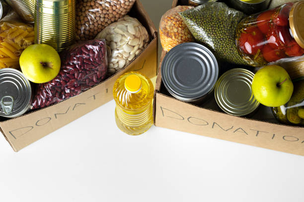 istock Donation box with various food. Pandemic support. 1300383424
