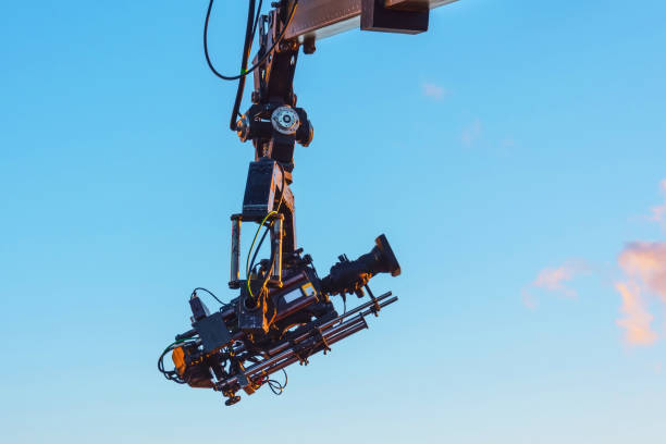 istock TV camera on a crane on at a public mass event. 1300383855