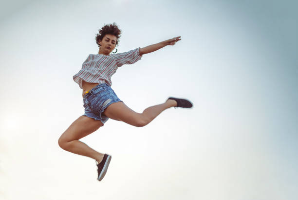 istock Woman in mid-air 1300384913