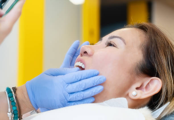 istock Dentist and patient in dental clinic 1300390799