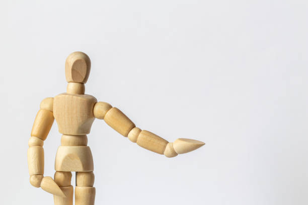 istock Portrait wooden figure isolated on white background. 1300391008