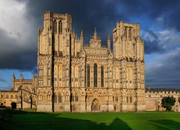 Photo of Facade Of St Andrew Cathedral Of Wells Somerset England Bathed In Golden Sunlight