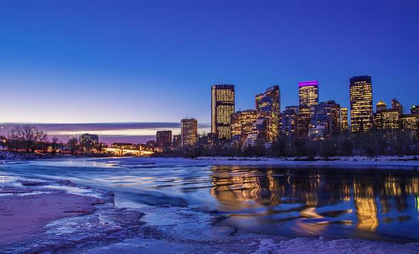 istock Downtown Calgary Reflecting In The Bow River At Sunrise 1300397782