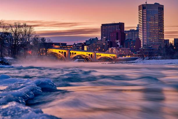 istock Sunrise Sky Glowing Over A Wintry Bow River By Downtown Calgary 1300397806