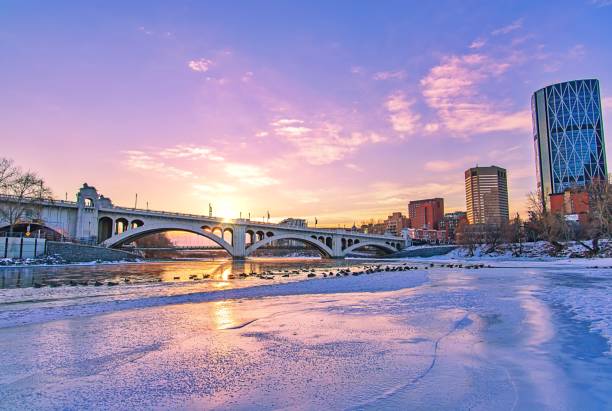 istock Sunrise Shining Down Over An Icy Bow River 1300397954
