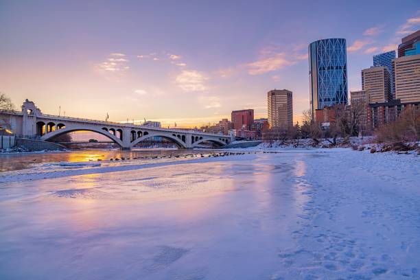 istock Sunrise Shining Down Over An Icy Bow River 1300397955