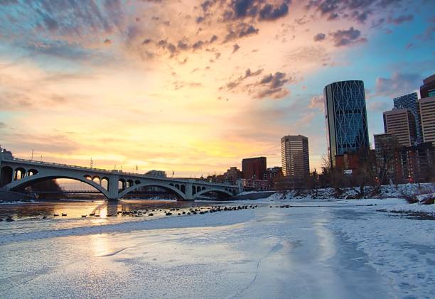 istock Sunrise Shining Down Over An Icy Bow River 1300397969
