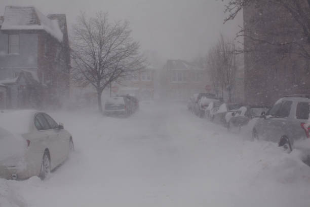 istock Very poor visibility due to strong wind and snow during a strong snow storm, blizzard 1300397989