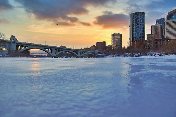 istock Sunrise Shining Down Over An Icy Bow River 1300398062