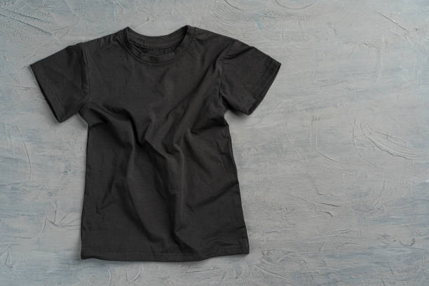 istock Black color plain t-shirt with copy space 1300398817