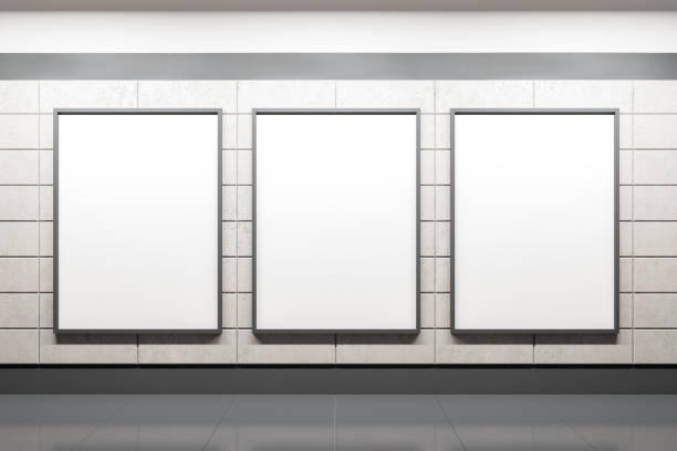 Modern subway station with three blank banner on wall. Modern subway station with three blank banner on wall. Advertisement and urban concept. Mock up. 3D Rendering print ad mockup stock pictures, royalty-free photos & images