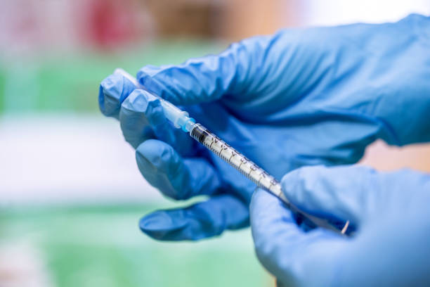 istock Preparation of a COVID 19 Vaccine dose 1300404218