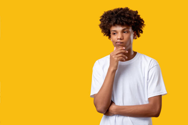 istock pensive black teenager difficult decision student 1300410709