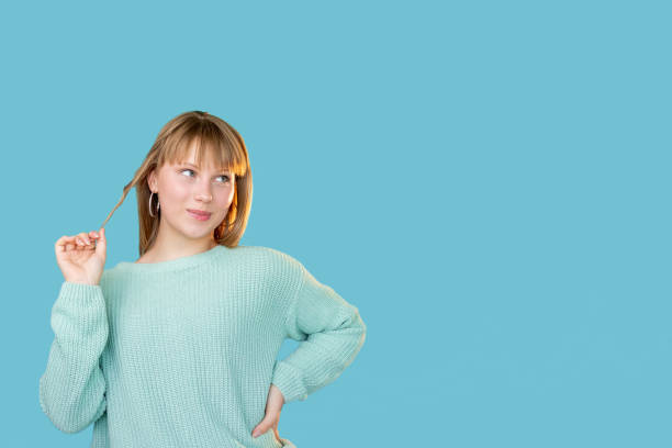istock shy woman advertising background curious flirting 1300410830