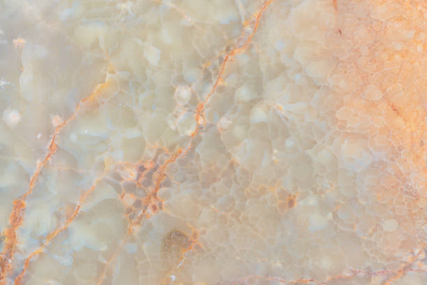 istock closeup natural ivory marble stone background 1300410960