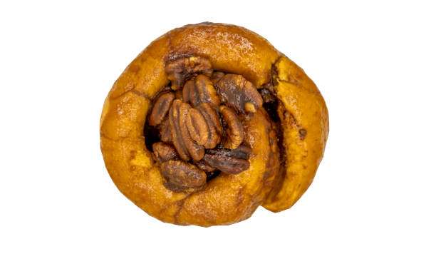 istock Pecan peanut Brioche isolated on white background. 1300411141