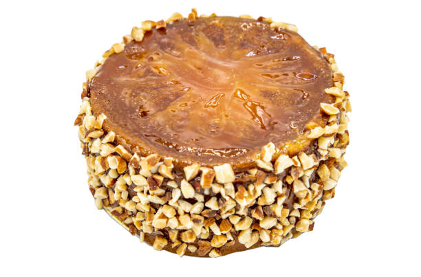 istock Bael fruit cake isolated on white background with clipping path. 1300411150