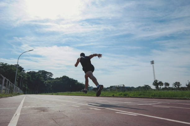 istock Runner in an athletics track 1300412354
