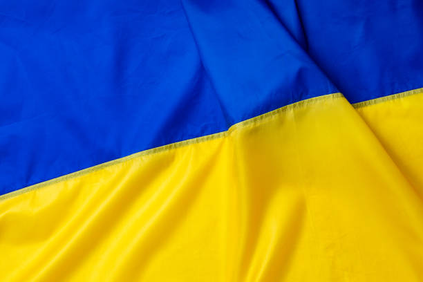 istock National flag of Ukraine fabric textile background 1300413101