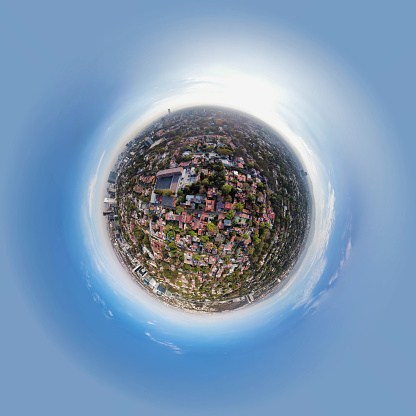 Aerial view of San Angel residential area in Mexico City, with office buildings in the foreground, tiny planet effect