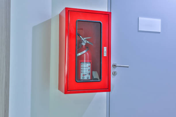 istock Hydrant with water hoses and fire extinguish equipment. Fire safety equipment in the red box on wall cement . Hydrant with water hoses and fire extinguish equipment / fire hose box . 1300422422