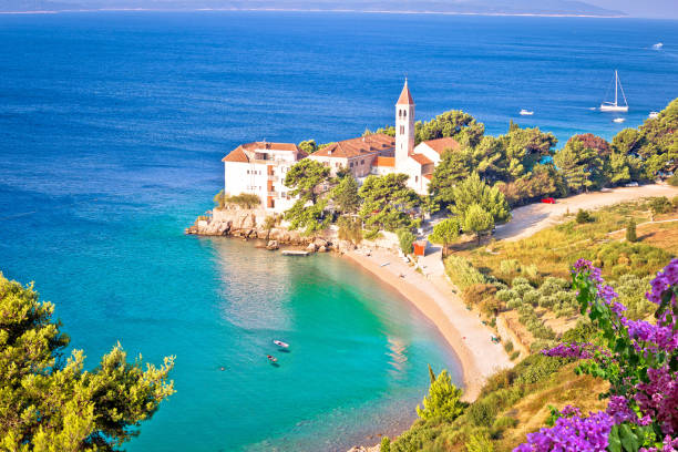 istock Bol on Brac island. Monastery on pebble beach in Bol view 1300431335