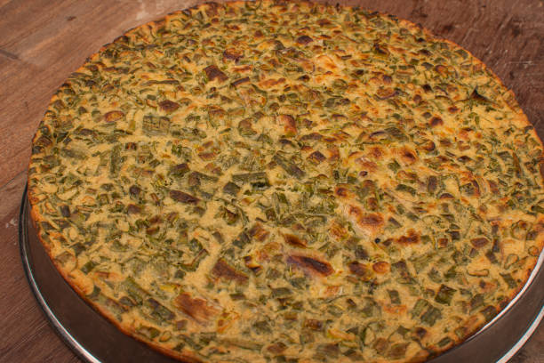 istock Traditional Italian pizza dish, vegetables and cheese 1300434082