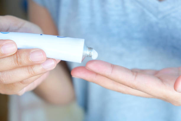 istock The woman's hand, she uses steroids Apply External type 1300434225
