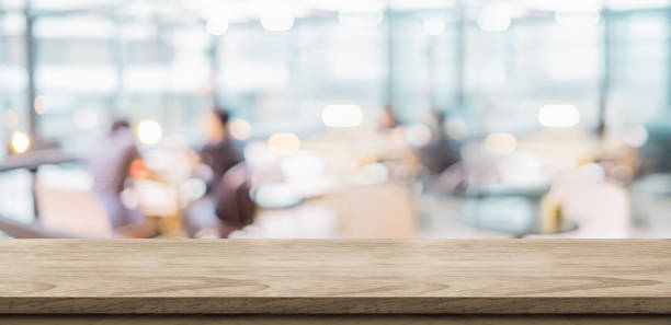 Empty rustic wood table and blurred soft light in restaurant with bokeh background. product display template.Business presentation
