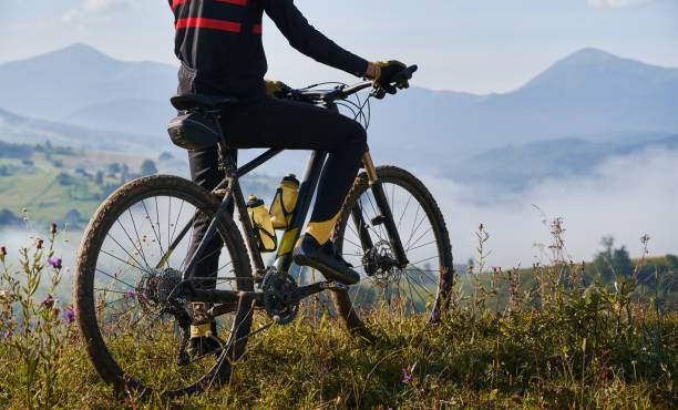 istock Young man riding a mountain bike downhill style 1300438667
